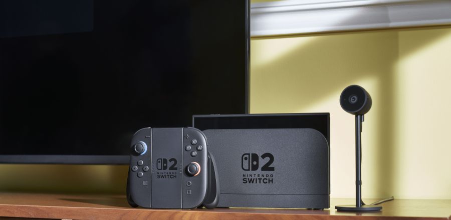 A beauty shot of Nintendo Switch 2, with a grip, dock and TV